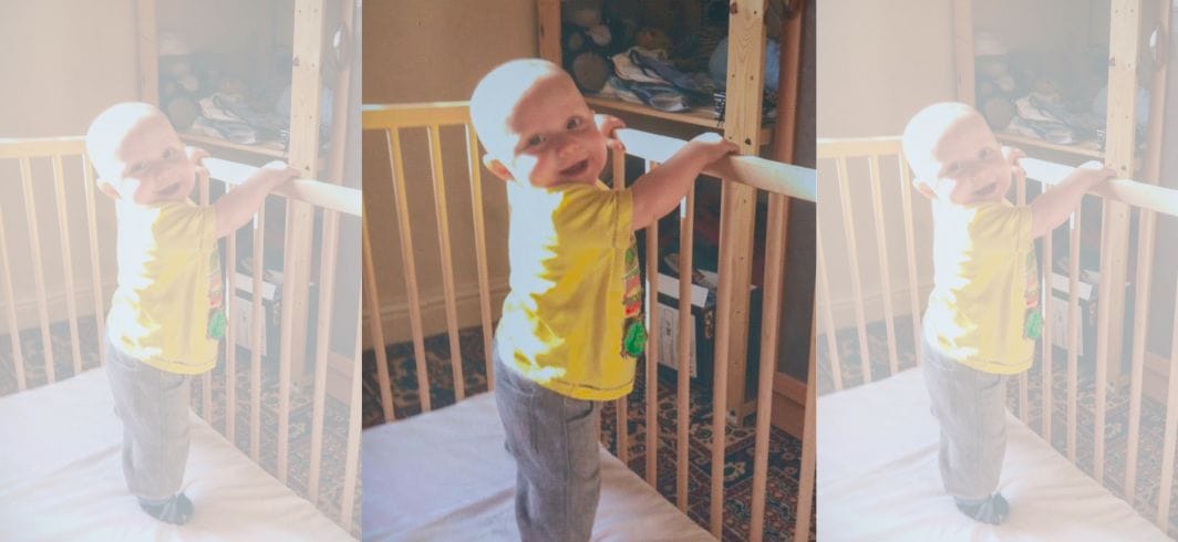 one year old layton smiling stood in crib concept surgical negligence sepsis mini banner