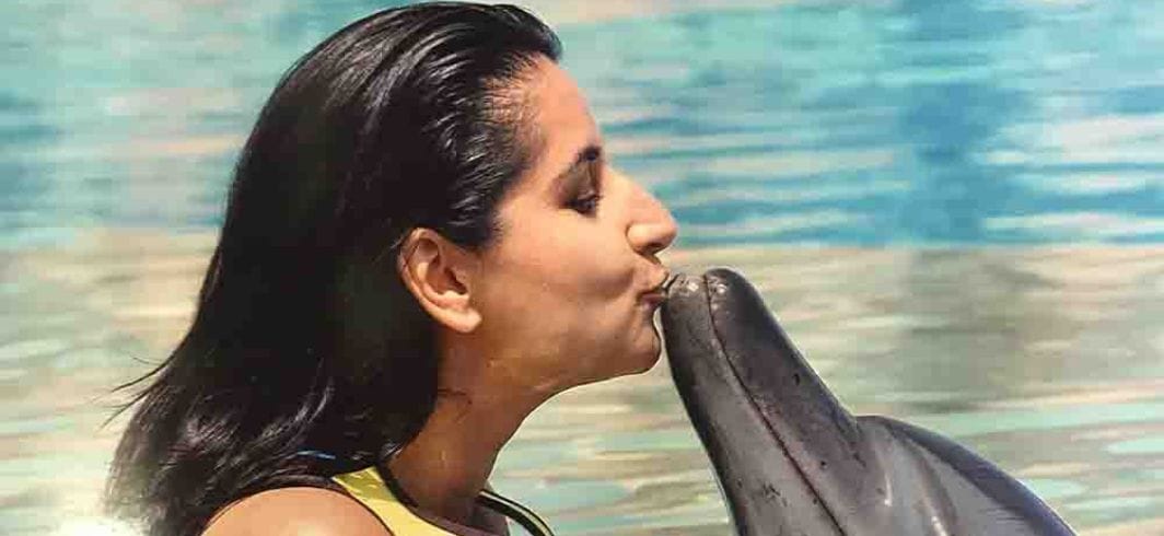 sonia bagga kissing a dolphin concept accidents abroad airplane accidents client
