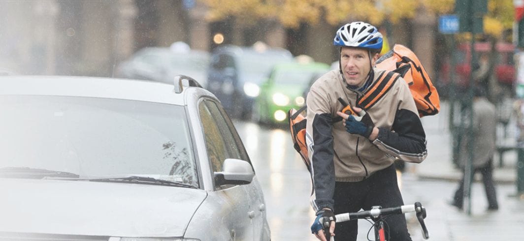 man on bicycle concept personal injury cycling accident claim mini hero
