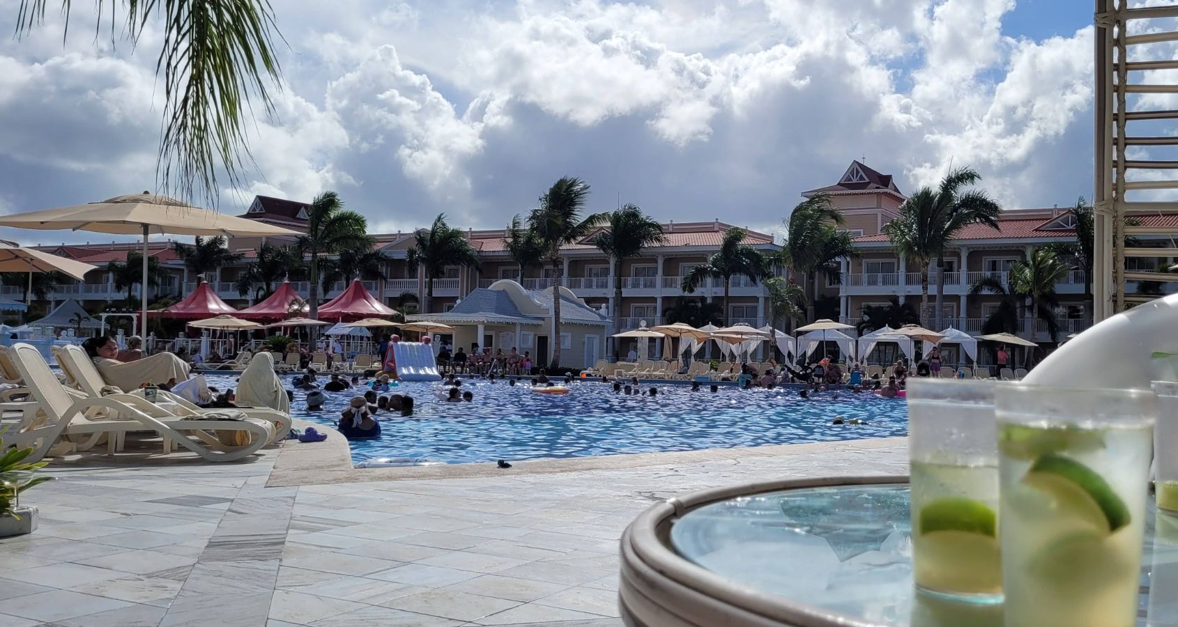 all-inclusive-resort-swimming-pool-and-tile-flooring-with-people-having-fun-in-the-pool-concept-swimming-pool-accident-compensation-claims