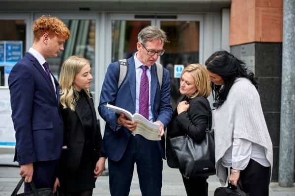 The team from Hudgell Solicitors at the Manchester Arena Inquiry read the published findings