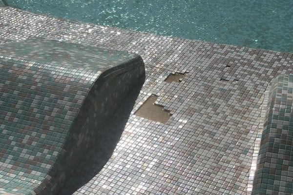 damaged pool tiles