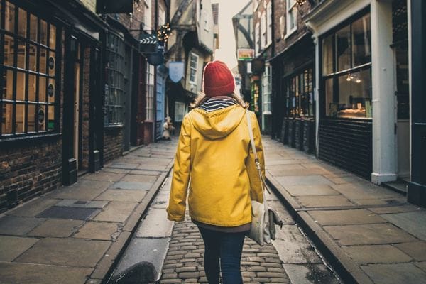 woman walking along in town centre