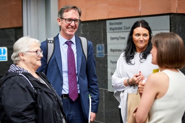 hudgell solicitors representation with rachel diclemente and terry wilcox supporting manchester arena victims outside mancheter magistrate court