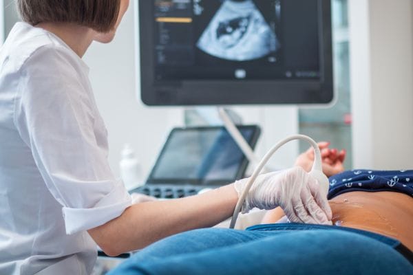 pregnant-woman-on-utltrasonographic-examination-at-hospital-concept-representing-medical-negligence-stillbirth-and-neonatal-compensation-claims