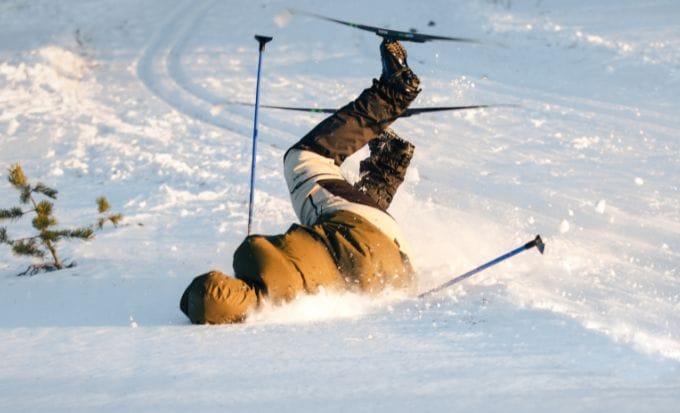 skier falling in the snow concept personal injury accidents abroad feature