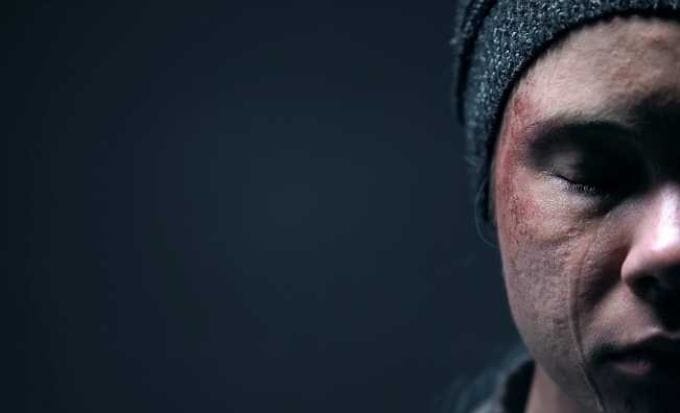 half face of crying violence victim closeup despair social problem concept criminal injury cica reviews and appeals feature image