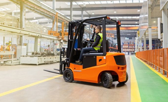 storehouse employee in uniform working on forklift in modern automatic warehouse concept accident at work forklift truck accident feature