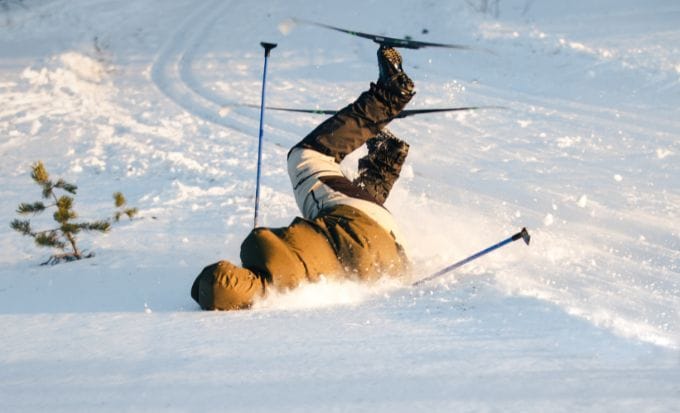 skier falling into the snow concept accidents abroad skiing accidents feature