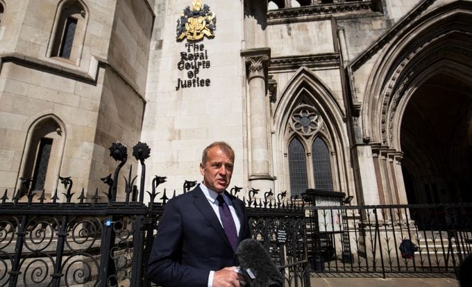 neil hudgell outisde the royal courts of justice concept civil liberties in the news feature