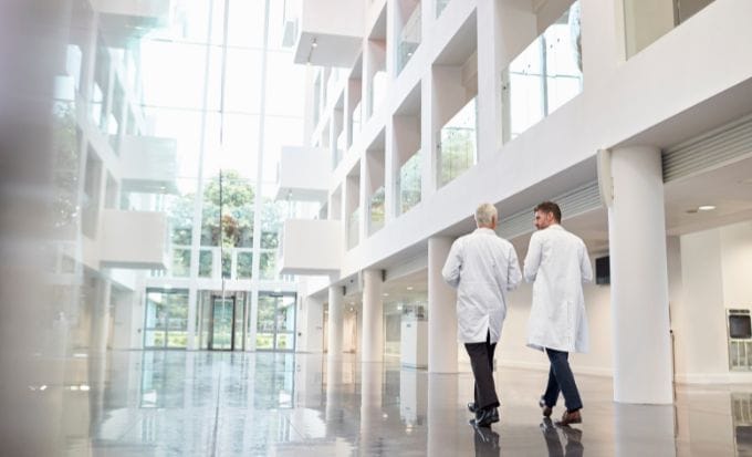 two men in the hospital concept medical negligence company news feature