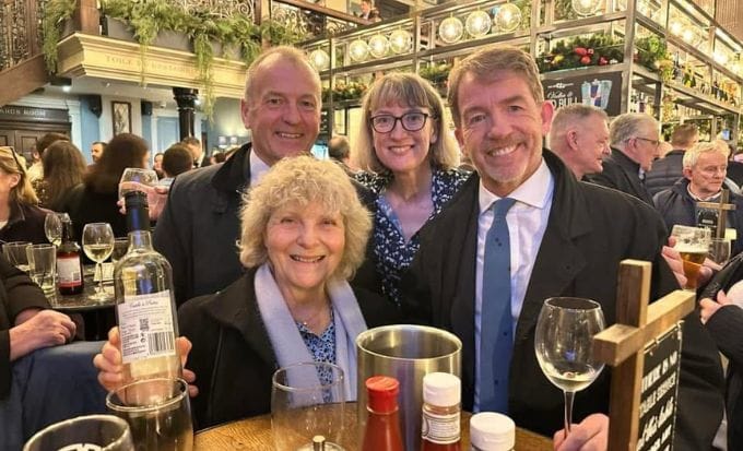 jo hamilton with neil hudgell and others enjoying drinks together concept feature