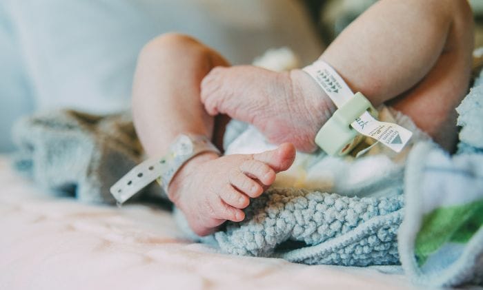 close up of newborn baby in hospital concept medical negligence birth injury